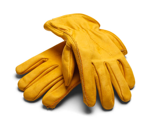 yellow construction work gloves isolated on white background.